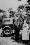 Henry and Ellen Judd by automobile